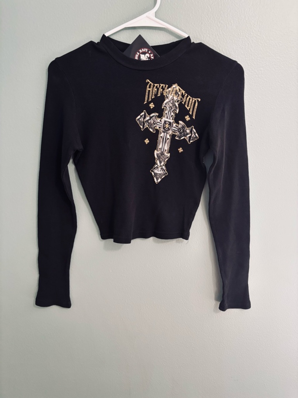 Zumiez Black Thermal Crop Top with Metallic Cross Graphic